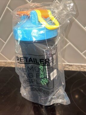 Blue and Black Shaker Bottle with Yellow/blue/orange lid
